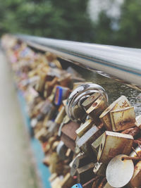 Close-up of padlocks on railing