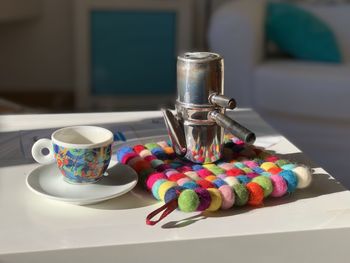 Close-up of coffee cup on table