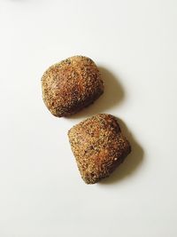 Close-up of cookies against white background