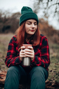 Young woman using mobile phone