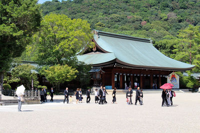 Group of people in front of building