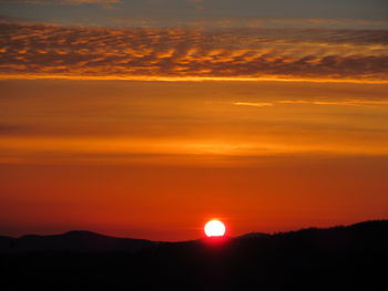 Scenic view of orange sky