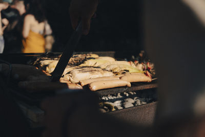Midsection of person preparing food