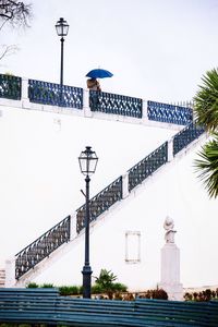 Low angle view of street light against sky
