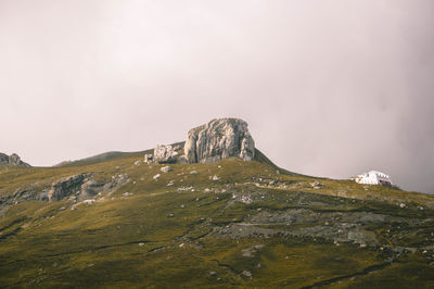 Scenic view of rocky mountains against sky