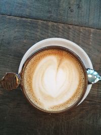 High angle view of cappuccino on table