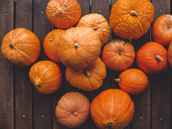 High angle view of pumpkins in crate