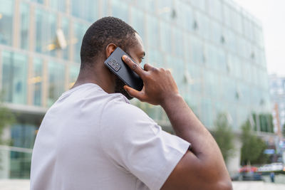 Young man using mobile phone