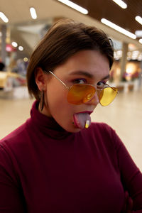 Close-up portrait of boy wearing sunglasses