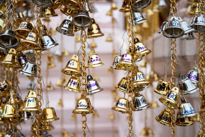 Close-up of clothes hanging for sale at market