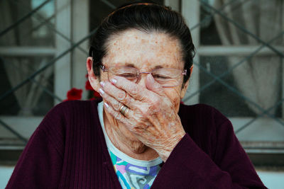 Close-up of smiling senior woman