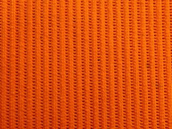 Full frame shot of orange patterned fabric