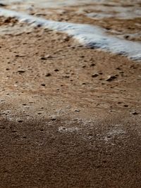 Close-up of sand on beach