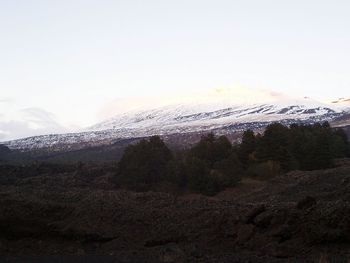 Scenic view of mountains against sky during winter