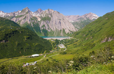 Scenic view of landscape and mountains against sky