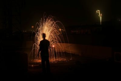 Silhouette of man at night