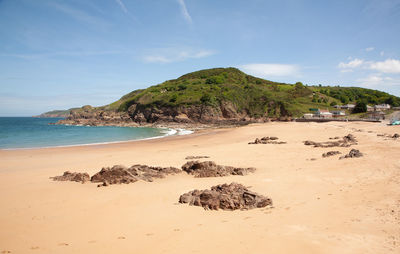 Cliffsand beach on the island of jersey in the english channel