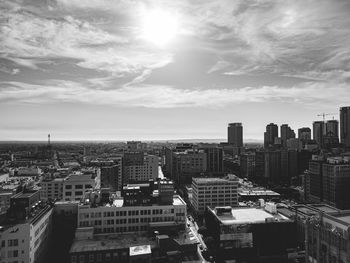 High angle view of modern buildings in city against sky