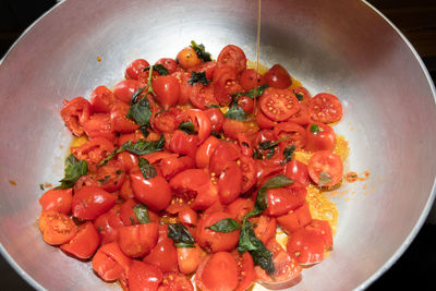 High angle view of tomatoes in cooking pan