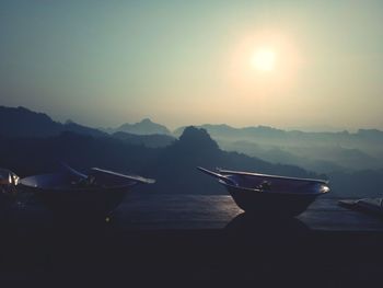 Scenic view of mountains against sky during sunset