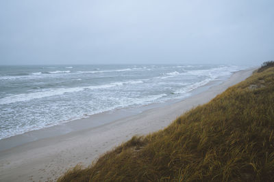 Scenic view of beach against sky