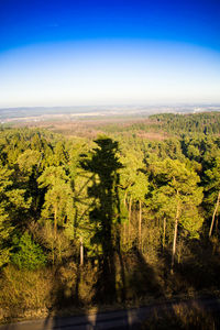 Scenic view of landscape against blue sky