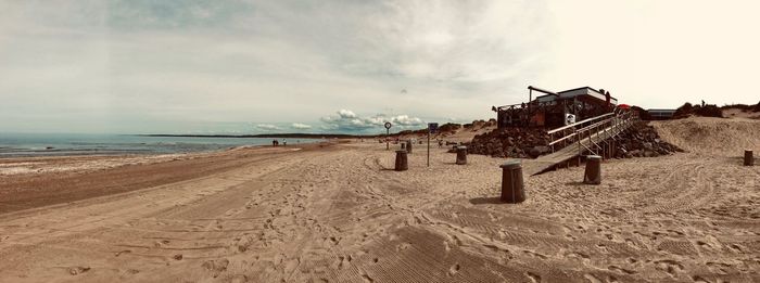 Scenic view of beach against sky