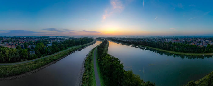 High angle view of cityscape against sky during sunset