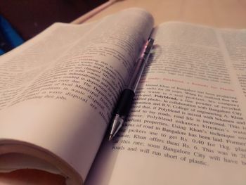 Close-up of open book on table