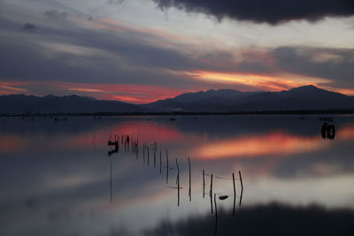 Scenic view of lagoon against sky during sunset, giliacquas lagoon 