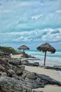 Scenic view of beach against sky