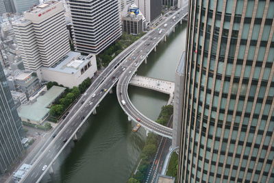 High angle view of bridge over canal in city