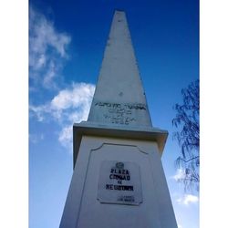 Low angle view of built structure against blue sky