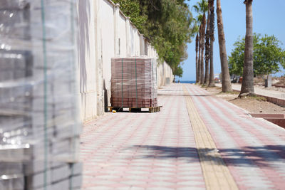 Road amidst buildings in city