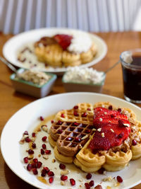 Close-up of breakfast served on table