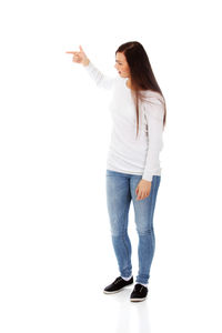Woman standing against white background
