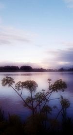 Scenic shot of calm lake against sky
