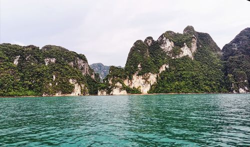 Scenic view of bay against sky