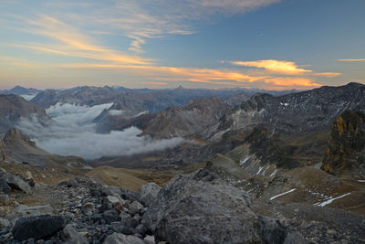 Scenic view of mountains against sky during sunset