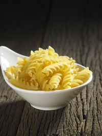 Close-up of fusilli pasta on table