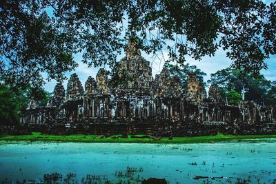 View of temple against cloudy sky