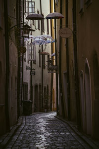 Alley amidst buildings in city