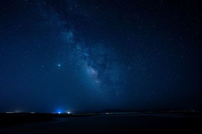 Scenic view of star field against sky at night