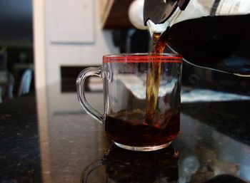 Close-up of tea in glass on table