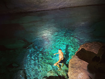 Man swimming in sea