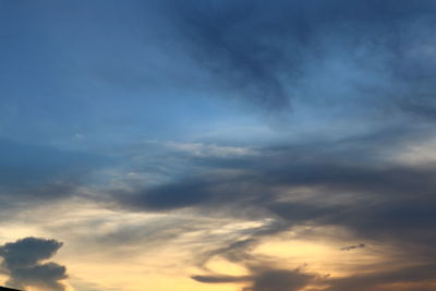 Low angle view of cloudy sky during sunset