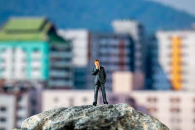 Man standing on rock