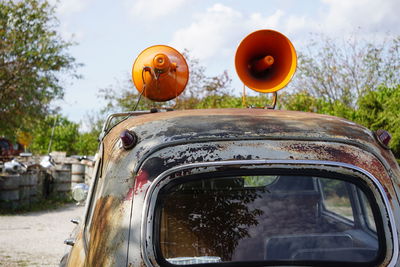 Megaphones on vintage car roof