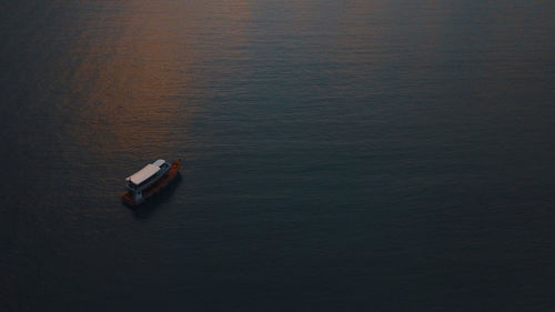 High angle view of boat floating on sea