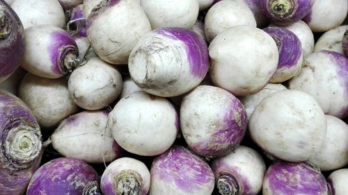 Full frame shot of onions for sale in market